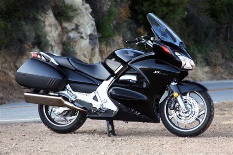 The following is a list of motorcycles, scooters and mopeds produced by honda. 2012 Honda ST1300 Review: Night Rider