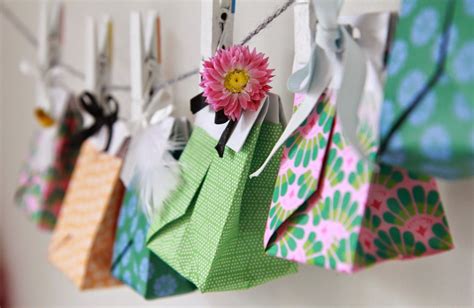 Origami T Bag Decorated With Ribbons Flowers And Feathers