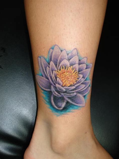 This tattoo joins polynesian styled and japanes styled. water lily | Water lily tattoos, Lily tattoo, Lily tattoo ...