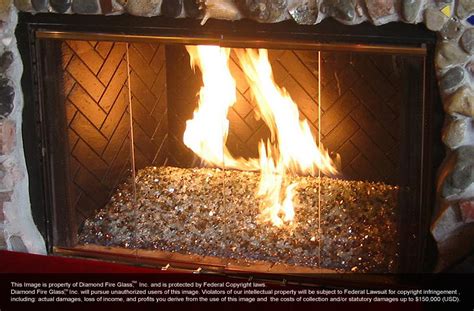He then laid a bed of regular playground sand from his local home department and placed his indoor fireplace burner above it. Legacy Premixed Diamond Fire Pit Glass - 60 LB Crystal Package