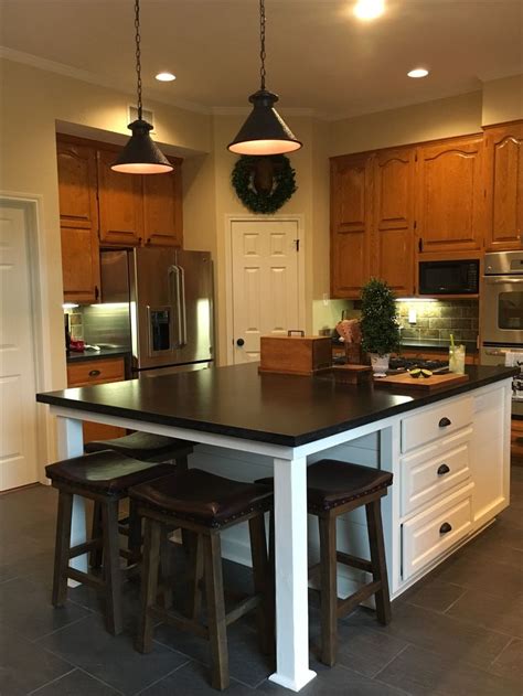 What we truly love about white oak in the kitchen is it's neutral, full of depth and dimension and it also creates a soft sense of luxury that really can't be matched. Updated kitchen with new white island, original honey oak ...