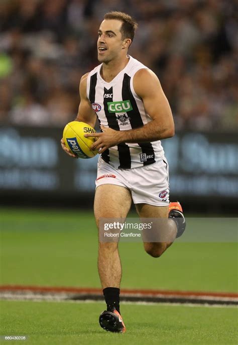 Steele Sidebottom Of The Magpies Runs With The Ball During The Round