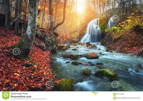 Waterfall At Mountain River In Autumn Forest At Sunset Stock Image