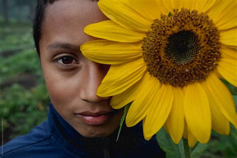 The Boy And The Sunflower Del Colaborador De Stocksy Nah N Rodr Guez