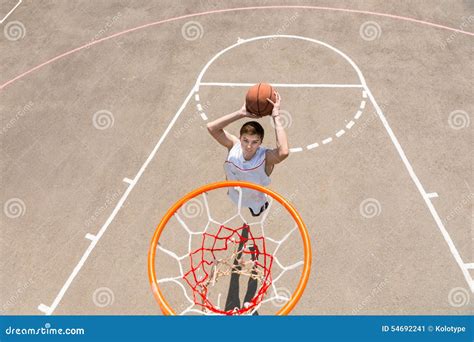 Young Man Making Jump Shot On Basketball Court Stock Image Image Of