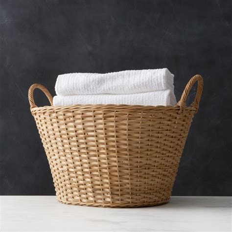 Storage bins can do more than organize a cluttered room or closet. Wicker Laundry Basket | Crate and Barrel