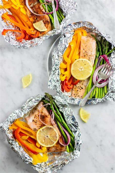 Since we weren't going to eat until after we set up camp, i thought we could cook the fish on the campsite fire pits, since they're cooking time for salmon foil packets can be hard to judge. Oven Baked Salmon Recipe - Sunkissed Kitchen