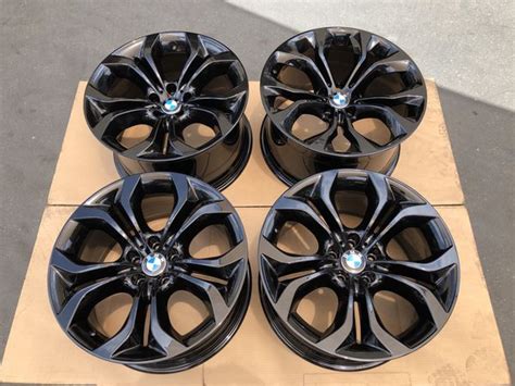 This is an aluminum wheel with a diameter of 20 width of 9. BMW X5 X6 OEM 20" staggered gloss black wheels set of 4 ...