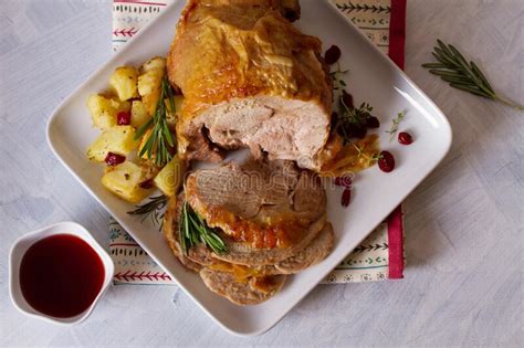 How to make our easier roast turkey and gravy. Roast Turkey Leg. Boned And Rolled Turkey Leg With Potatoes And Cranberries. Stock Image - Image ...