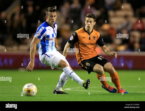 Wolverhampton Wanderers Tommy Rowe And Huddersfield Towns Jonathan Hogg During The Sky Bet