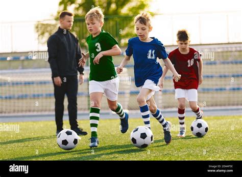 Happy Children Playing Soccer