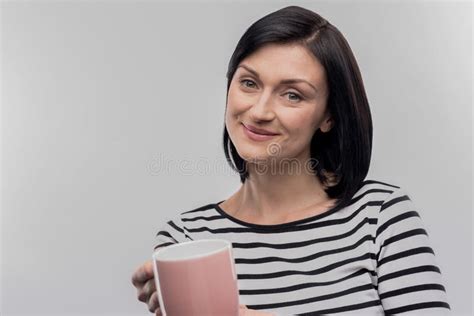 Caring Dark Haired Wife Offering Cup Of Tea Her Loving Husband Stock