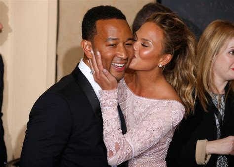 chrissy teigen celebrated john legend s win with a kiss best pictures from the golden globes