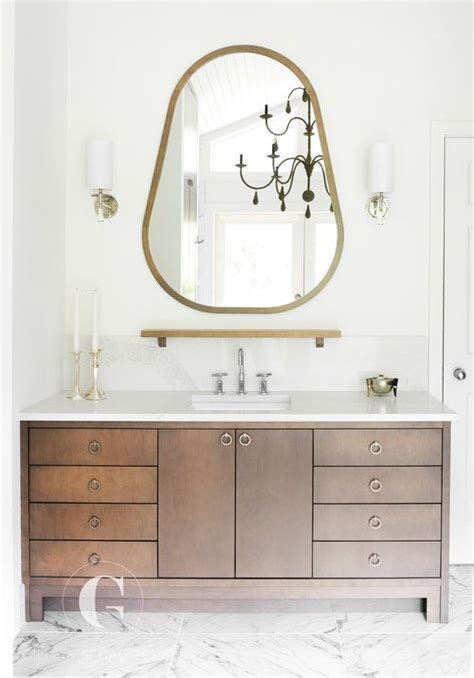 D mango vanity in gray with black granite countertop and white basin. A chocolate brown vanity is adorned with ring pulls and a ...