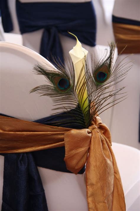 Navy Blue And Gold Taffeta Sash With Peacock Feather And Calla Lilly As