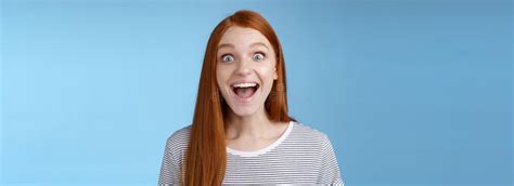 Surprised Pleased Happy Impressed Redhead European Girl 20s Reacting Amused Wide Eyes Look