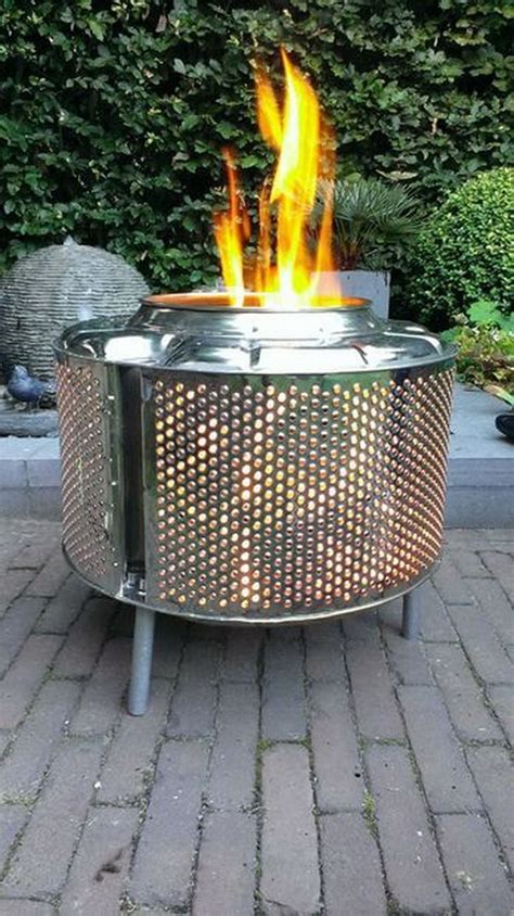 The drum from a defective washing machine. 35 DIY Fire Pit Ideas - Hative