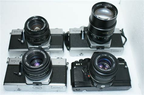 A Lot Of 4 Single Lens Reflex Cameras A Praktica Mlt 3 A Catawiki