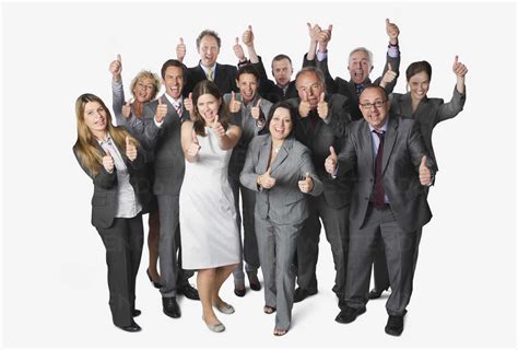 Large Group Of Business People Showing Thumbs Up Against White