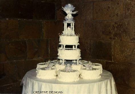 Keep in mind that your wedding cake will leave an impression on your guests. Circa 1980's | Wedding Cakes & Flowers | Pinterest