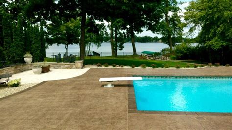 Stamped And Colored Concrete Pool Deck With Custom Cantilevered Concrete Coping By Sierra