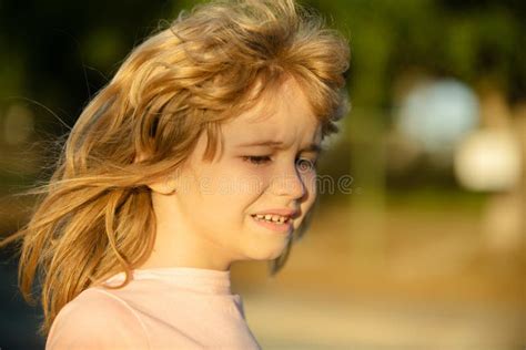 Unhappy Sad Kid Face Closeup Face Of Child Boy Crying Outdoor Tears