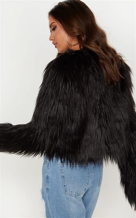 liddie black faux fur shaggy cropped jacket prettylittlething ca
