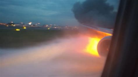 Airplane Engine Bursts Into Flames After Making Emergency Landing Youtube