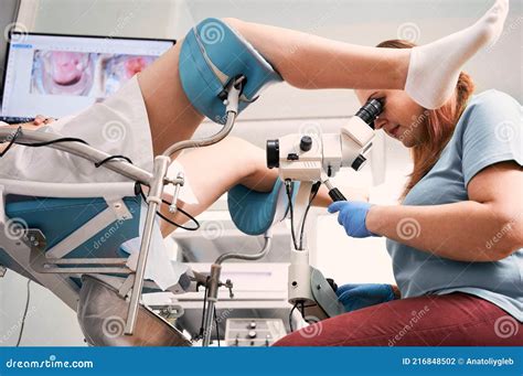 Gynecologist Examining Female Patient With Colposcope Stock Photo Image Of Colposcope