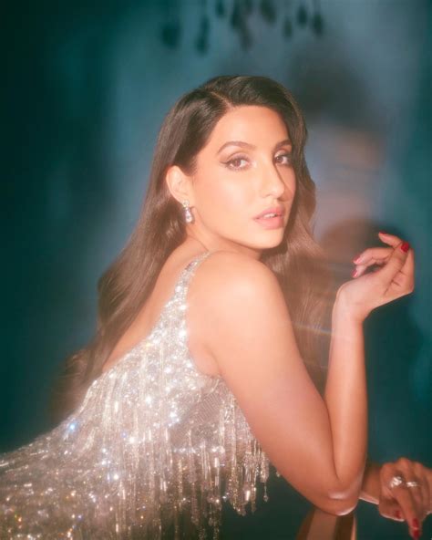 Nora Fatehi Is Too Hot To Handle Flaunting Ample Cleavage And Fine Curves In This Backless Dress