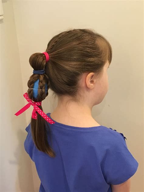 Curly hair, though packed with life and personality, gets a little quiet when the proposal of styling in intricate updos, perky ponytails, and elaborate braids comes up. Easy Easter hairdo with accent braid | Hairdo, Hair styles ...