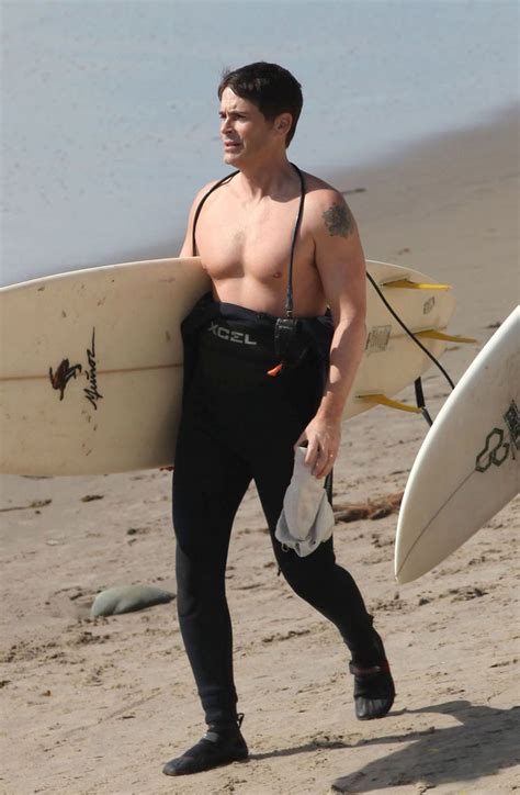 The Celeb Archive Rob Lowe Shows Off His Shirtless Physique As He