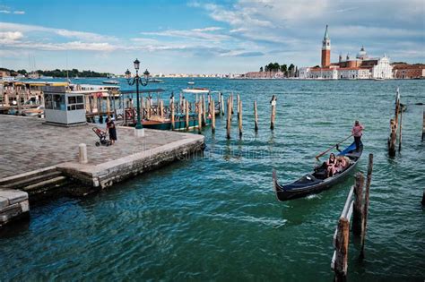 Gondolas And In Lagoon Of Venice By Saint Mark San Marco Square