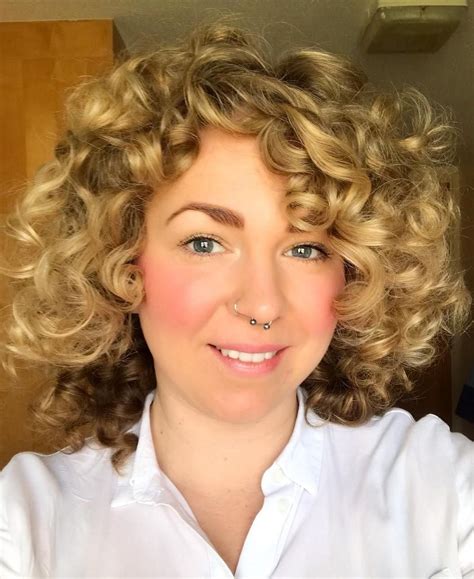 Mid Length Hairstyle With Tight Large Curls In Short Permed Hair
