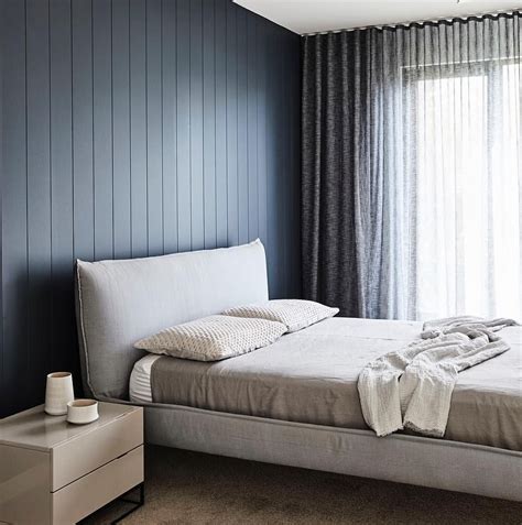 V Groove Panelling Adding Depth And Moodiness To The Master Bedroom Of