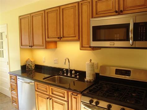 For more advice regarding selecting a kitchen cabinet, you must consult a professional home décor specialist. Light Brown Kitchen Cabinets | Sandstone Rope Door ...