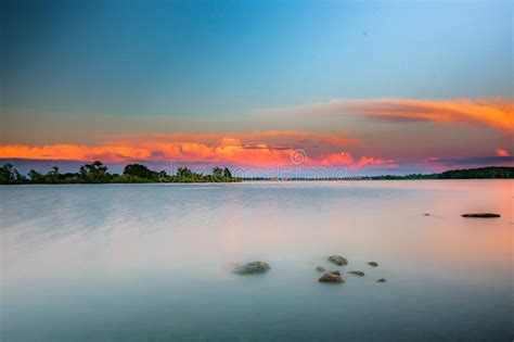 Sunset in Long Sault park stock image. Image of exposure - 99070617