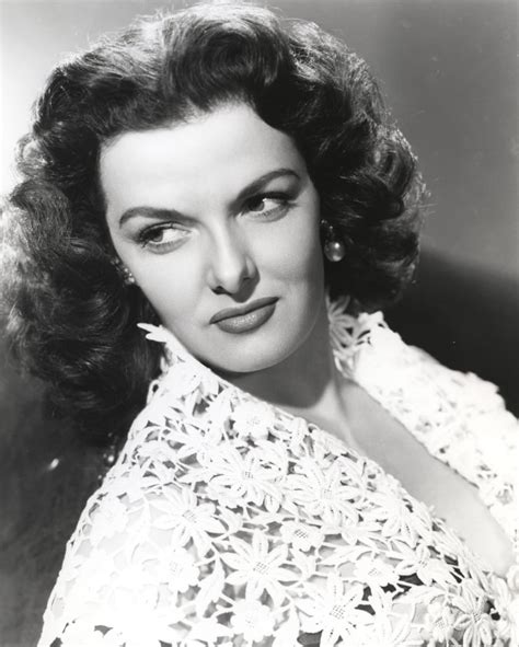 Jane Russell Portrait In White Floral Lace Dress While Leaning Back And