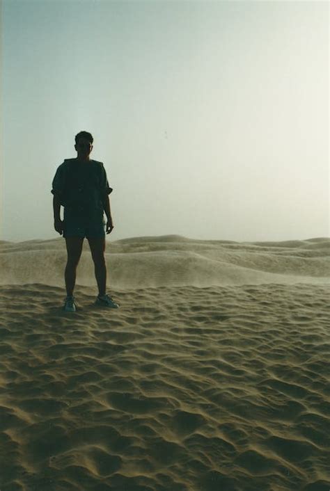 Man Standing On Desert · Free Stock Photo