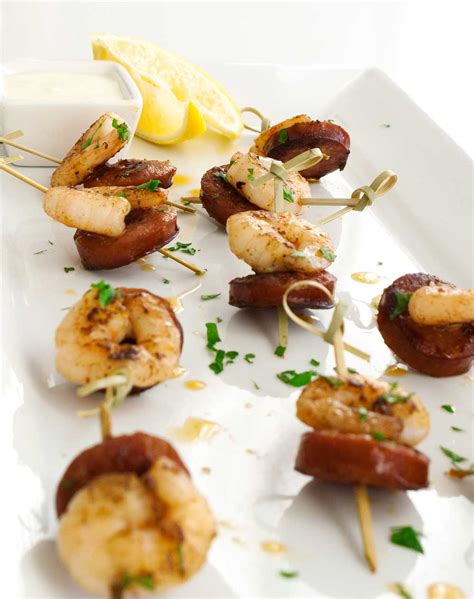 Chorizo And Prawns Skewers With A Creamy Lemon Dip Sprinkles And Sprouts