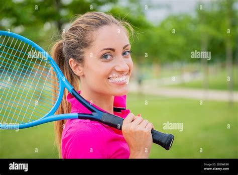 Portrait Of Tennis Player Girl Holding Racket Outside Portrait Beautiful Blonde Girl Who Is