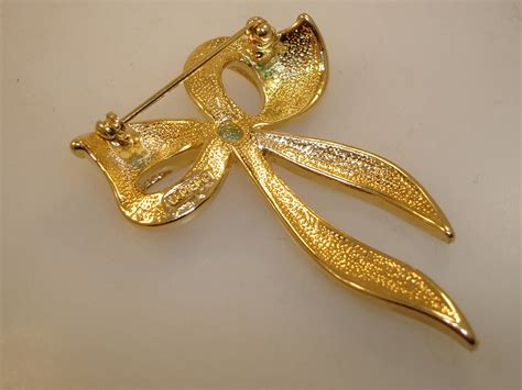 Vintage Napier Gold Tone Sparkling Rhinestone Bow Pin Brooch