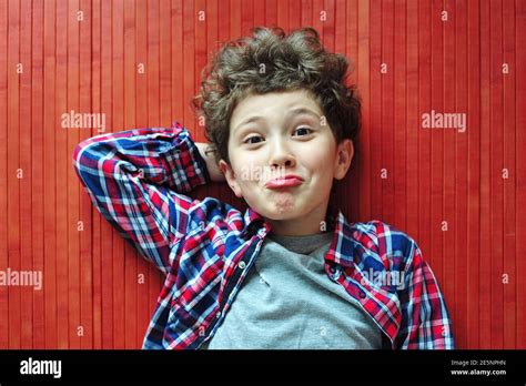 Funny Little Boy Makes Funny Faces Stock Photo Alamy