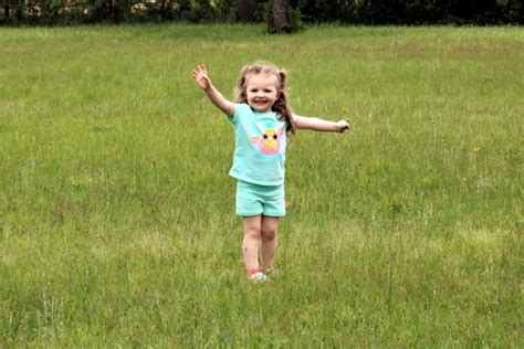 Happy Little Girl In Grass Free Stock Photo Public