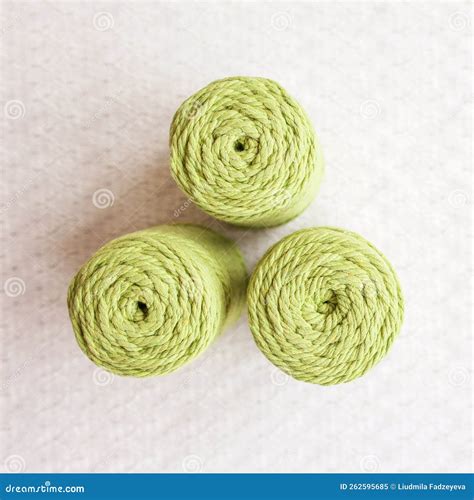 Handmade Macrame Braiding and Cotton Threads on Textile White