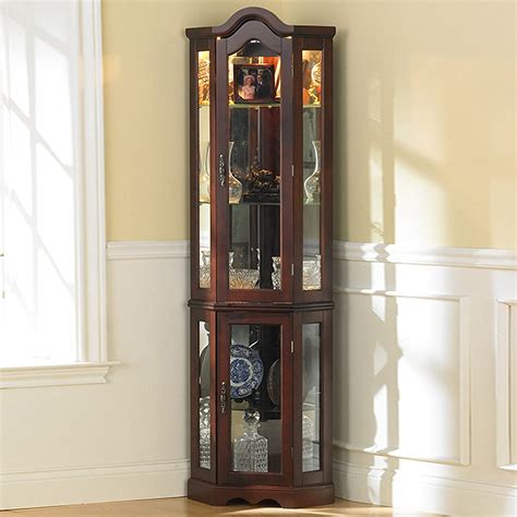 It is a cabinet made of glass based on a steel frame. Cabinet Corner Curio Wood Glass Door Shelf Trophy ...