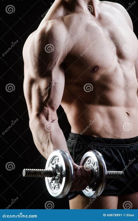 The Muscular Ripped Bodybuilder With Dumbbells Stock Image Image Of