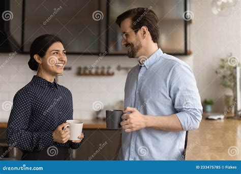 Happy Female Indian Employee Communicating With Male Colleague Stock Image Image Of Client