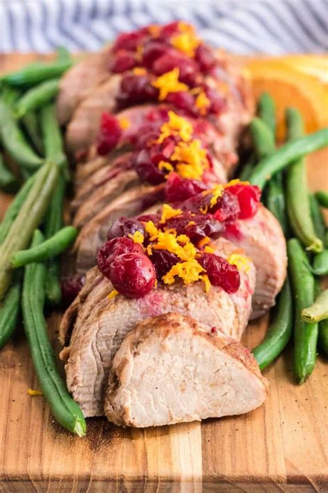 Add the remaining cranberry sauce ot the juices in the slow cooker and stir to combine. Slow Cooker Pork Tenderloin With Cranberries & Orange - The Farm Girl Gabs®