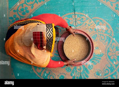 Indian Women Cleaning Food Grains Stock Photo Alamy